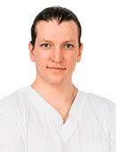 Имплантолог, стоматолог Евгений Игоревич Маслий