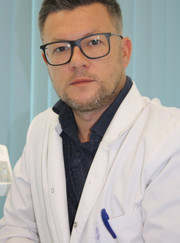 Главный врач, имплантолог Дмитрий Вячеславович Заезжалкин