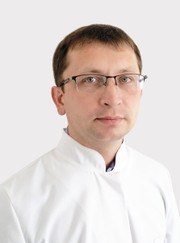 Отоларинголог Юрий Александрович Букин