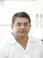 Имплантолог, стоматолог Владимир Егорович Романищев