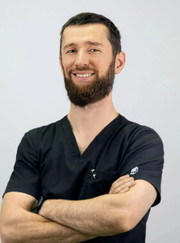 Имплантолог, стоматолог Денис Георгиевич Ецадашвили