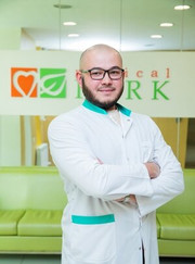 Хирург, эндоскопист Жанат Ескенович Алибеков