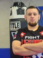 Тренер по боевым искусствам, тренер по боксу Алексей Александрович Болотоков