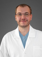 Абдоминальный хирург, колопроктолог Александр Евгеньевич Миллер