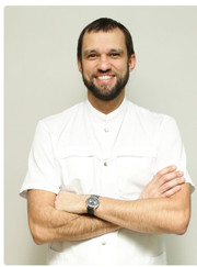 Главный врач, ортодонт Евгений Юрьевич Поздний